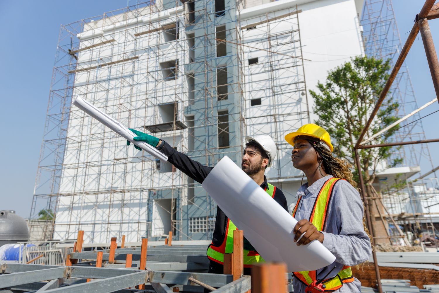 construction workers building high-rise buildings